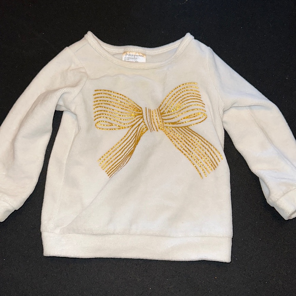 White with gold bow sweater